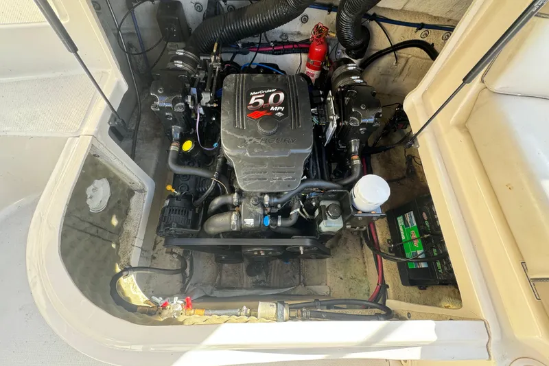 Slide: The Image of Engine compartment of a 2005 Sea Ray 240 Sundeck with MerCruiser 5.0 MPI engine. - 14