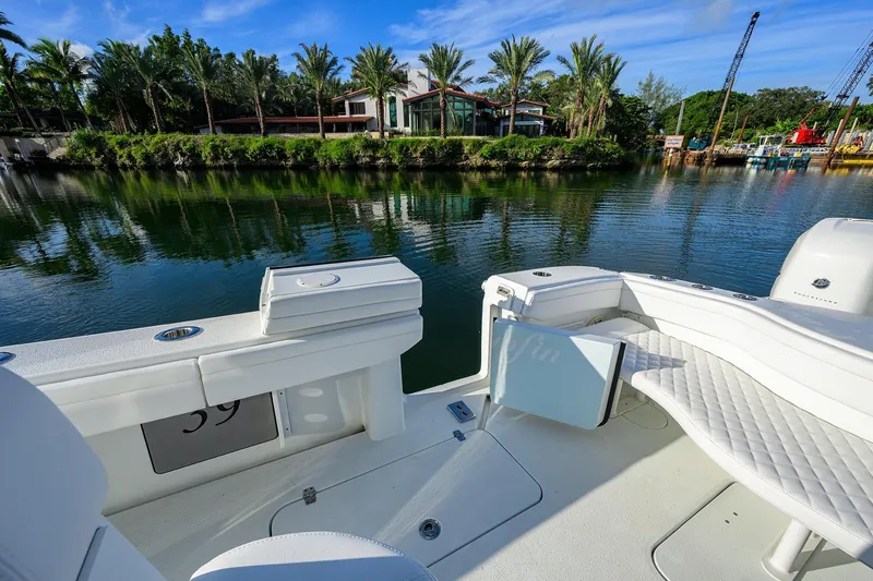 Slide: The Image of 2021 Yellowfin 39 Offshore boat interior with scenic waterfront view. - 34