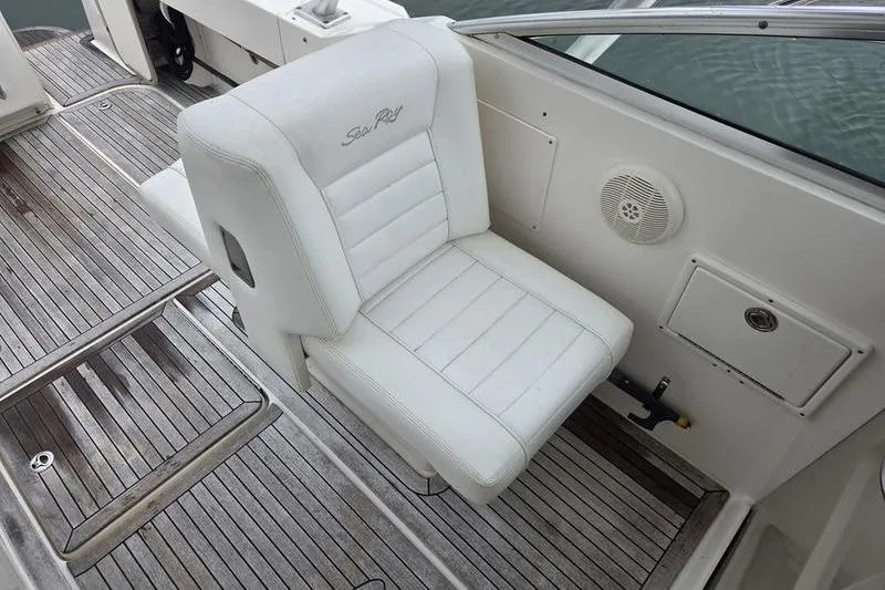 Slide: The Image of White seat on 2008 Sea Ray 290 Amberjack boat with wooden deck. - 17