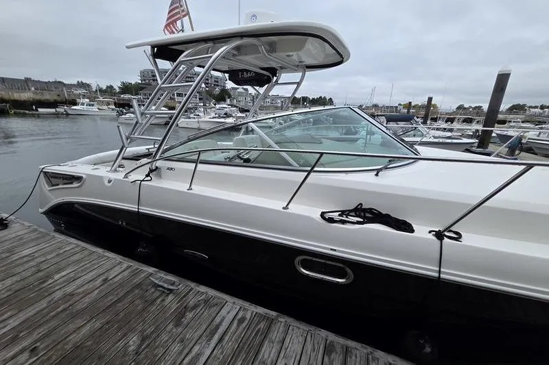 Slide: The Image of 2008 Sea Ray 290 Amberjack docked at marina, side view. - 3