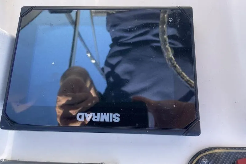 Slide: The Image of Simrad marine display on a 2012 Grady-White Freedom 255 boat. - 9