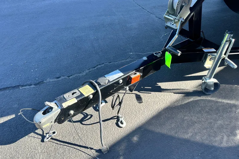 Slide: The Image of 2019 Scarab 215 Wake ID boat interior with seating and steering wheel. - 10