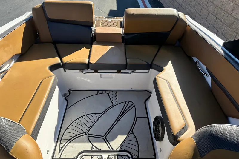 Slide: The Image of Interior of 2019 Scarab 215 Wake ID boat with seating and cup holder. - 18