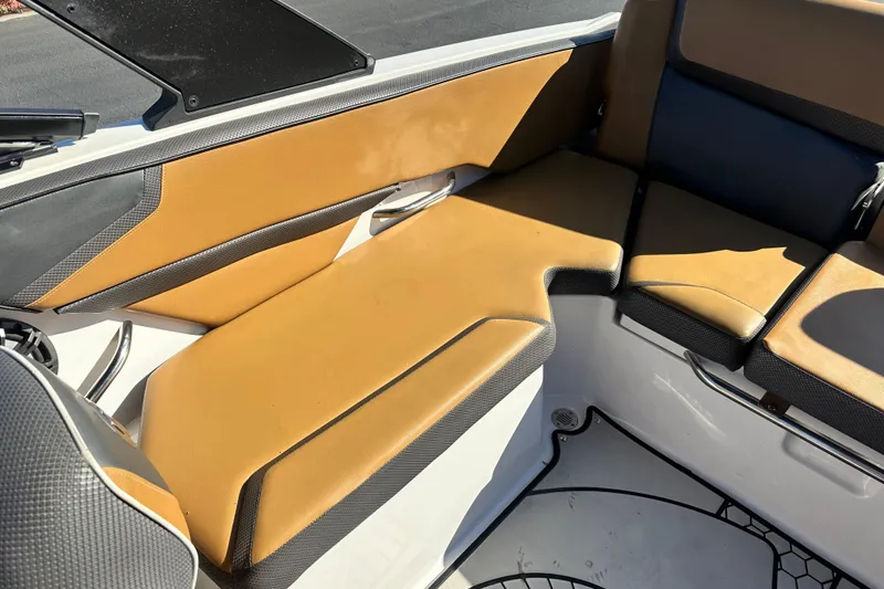 Slide: The Image of Trailer hitch of a 2019 Scarab 215 Wake ID on asphalt surface. - 21