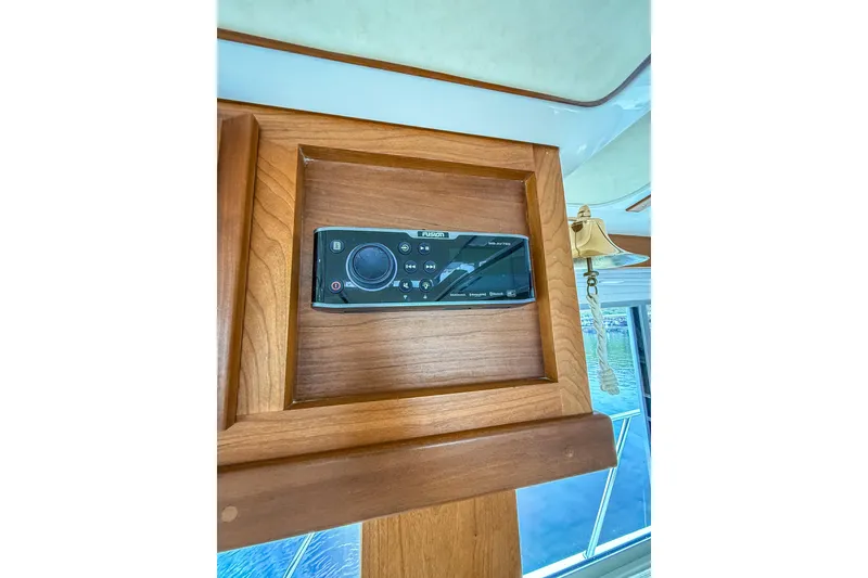 Slide: The Image of 2016 Back Cove 41 yacht interior with audio system and brass bell. - 15