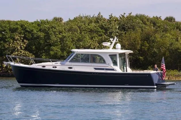 Slide: The Image of Manufacturer Provided Image: 2016 Back Cove 41 yacht cruising on calm water. - 2