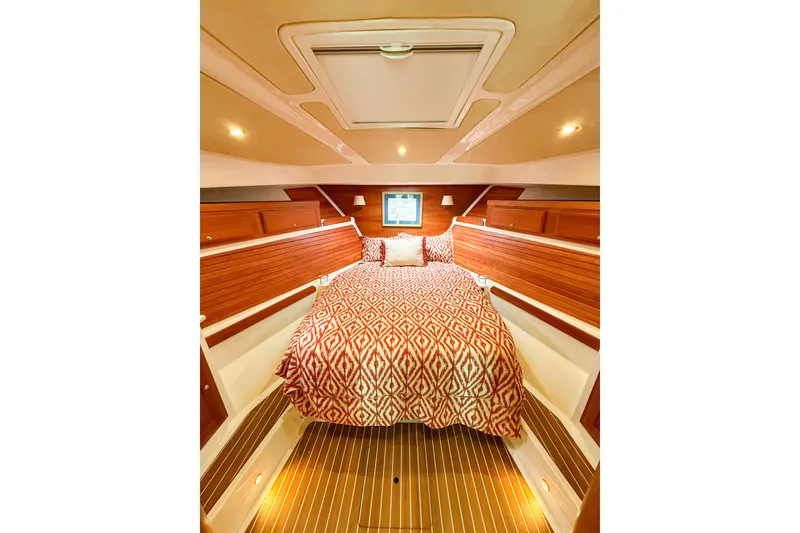 Slide: The Image of Luxurious cabin interior of 2016 Back Cove 41 yacht with cozy bedding. - 28