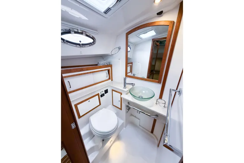 Slide: The Image of Luxurious bathroom in 2016 Back Cove 41 yacht with modern fixtures and elegant design. - 39