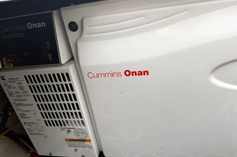 Slide: The Image of Cummins Onan generator in 2016 Back Cove 41 boat engine room. - 48