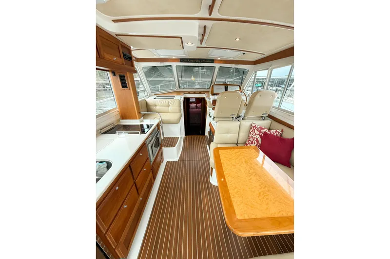 Slide: The Image of Luxurious interior of a 2016 Back Cove 41 yacht with elegant wood finishes. - 7