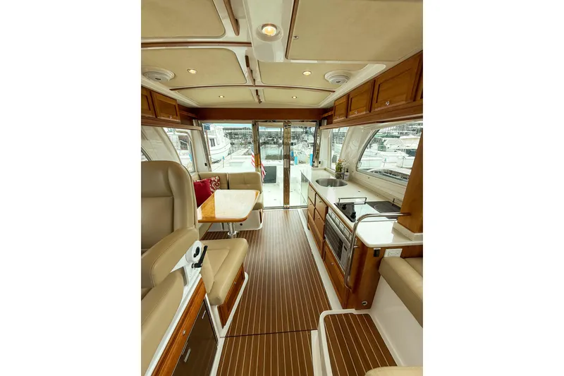 Slide: The Image of Luxurious interior of 2016 Back Cove 41 yacht with elegant seating and modern kitchen. - 8