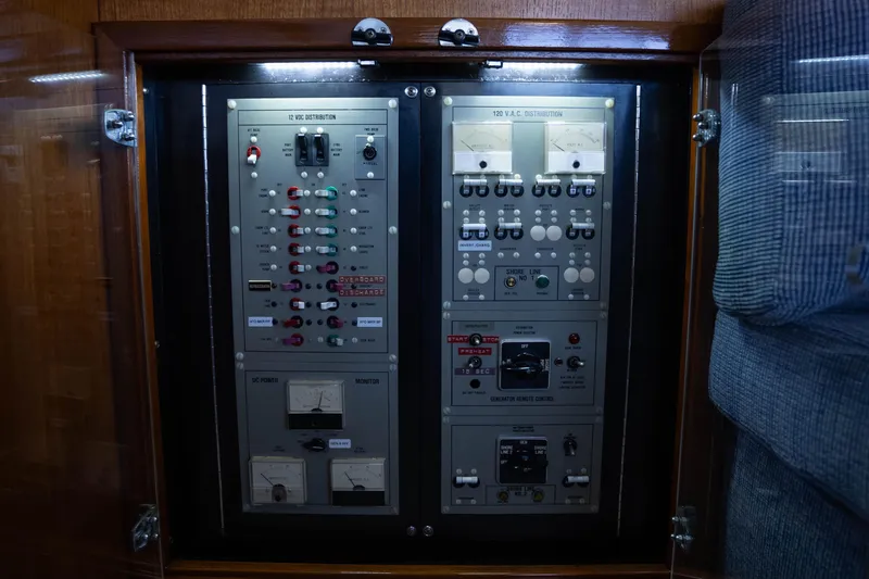 Slide: The Image of Electrical control panel on a 1984 Bertram 35 Convertible boat. - 33