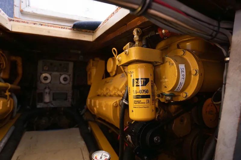 Slide: The Image of Engine room of a 1984 Bertram 35 Convertible with CAT fuel filter. - 35