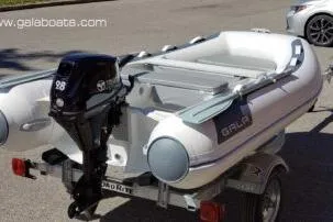 Slide: The Image of 2026 Gala A300HD inflatable boat on trailer with outboard motor. - 9