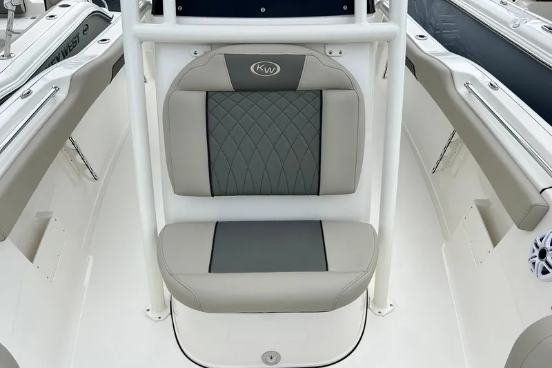 Slide: The Image of 2026 Key West 239 FS boat seat with gray and beige upholstery. - 13