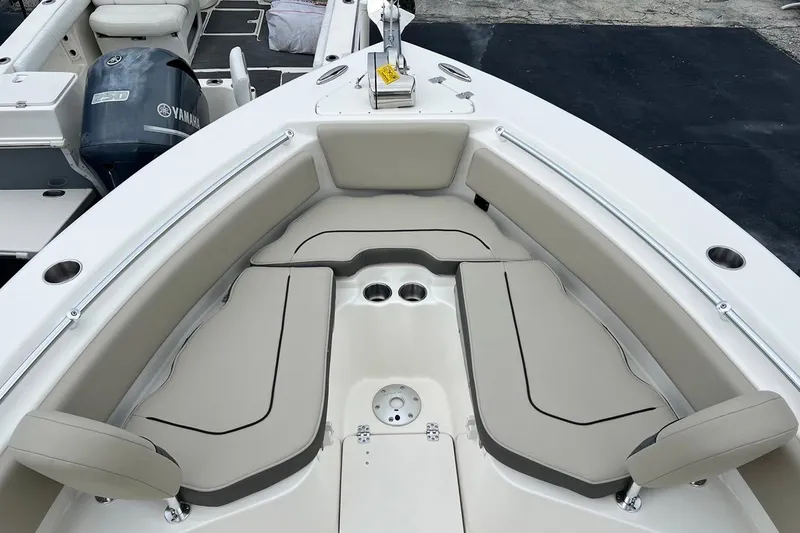Slide: The Image of 2026 Key West 239 FS boat interior with cushioned seating and Yamaha engine. - 15