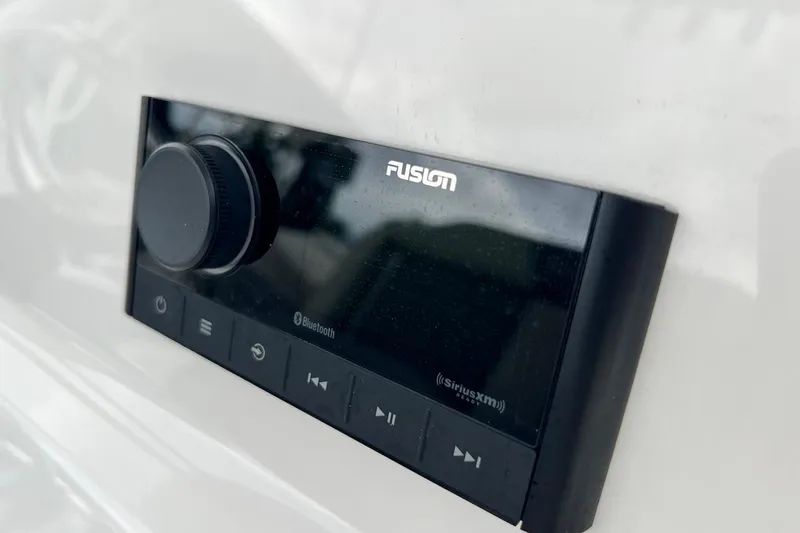 Slide: The Image of Fusion audio system on 2026 Key West 239 FS boat, featuring Bluetooth and SiriusXM capabilities. - 33