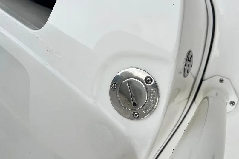 Slide: The Image of Close-up of a 2026 Key West 239 FS boat waste cap. - 43