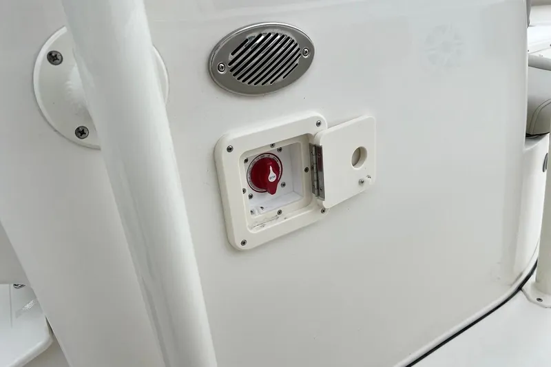 Slide: The Image of 2026 Key West 239 FS boat control panel with red switch and speaker. - 45