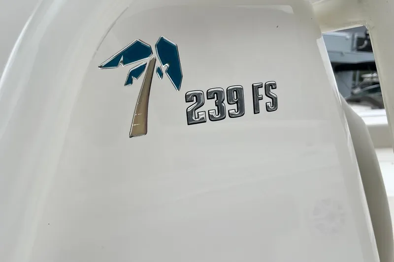 Slide: The Image of Key West 239 FS boat logo on white surface, 2026 model. - 46