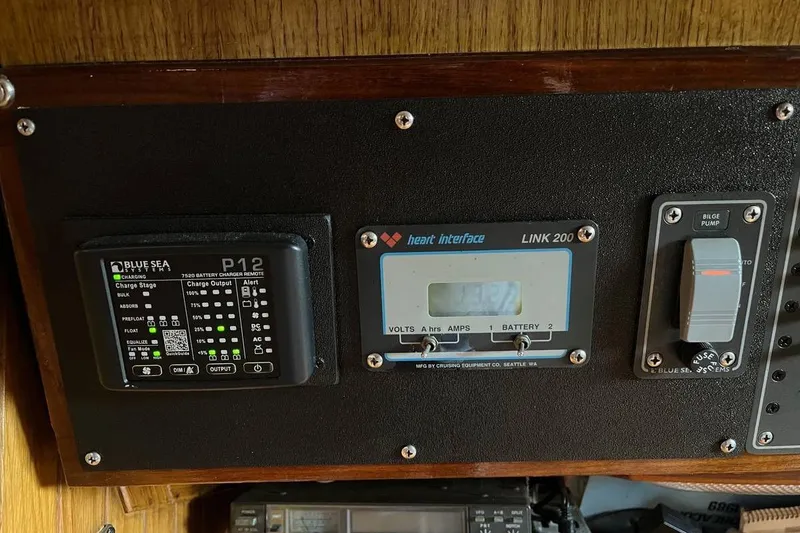 Slide: The Image of Control panel of a 1989 Fortuna 37 boat with battery and bilge pump indicators. - 10