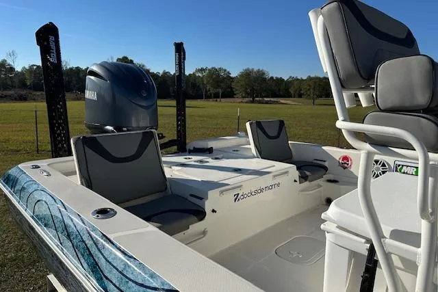 Slide: The Image of 2023 Skeeter SX240 boat with Yamaha engine, featuring spacious seating and modern design. - 3