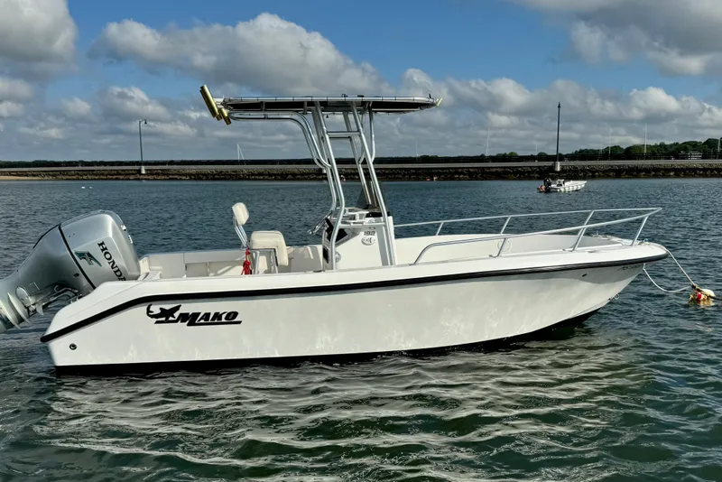 Slide: The Image of 2007 Mako 192 Center Console boat on water, featuring Honda outboard motor. - 1