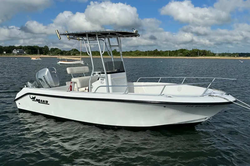 Slide: The Image of 2007 Mako 192 Center Console boat on water, featuring a Honda outboard motor. - 2