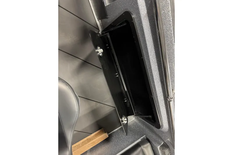 Slide: The Image of 2026 Nitro ZV20 Sport Pro boat interior storage compartment. - 11