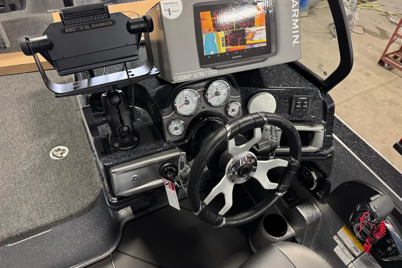 Slide: The Image of 2026 Nitro ZV20 Sport Pro dashboard with Garmin Echomap Ultra 126sv and modern controls. - 14