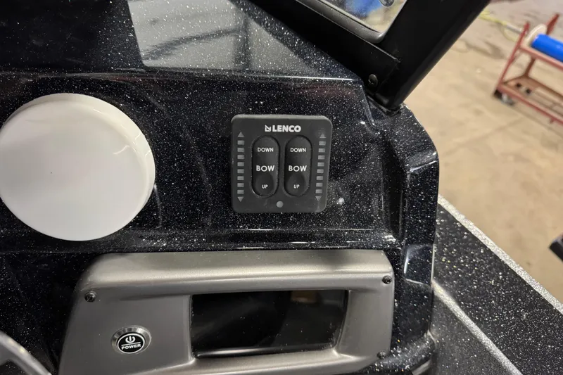 Slide: The Image of Control panel of 2026 Nitro ZV20 Sport Pro boat with Lenco trim tab switches. - 16