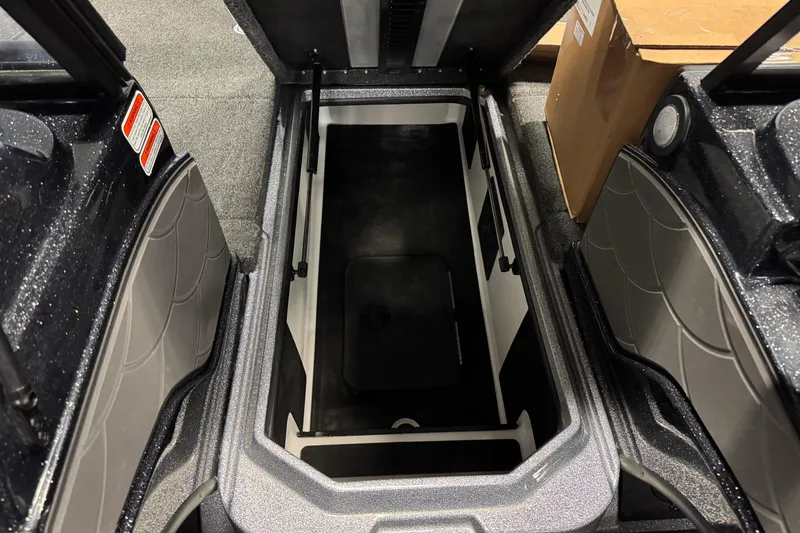 Slide: The Image of Open storage compartment in 2026 Nitro ZV20 Sport Pro boat. - 17