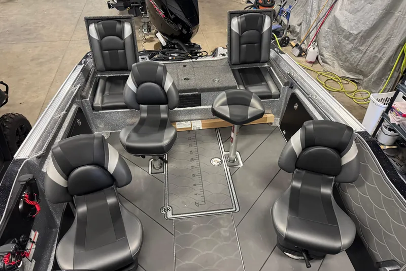 Slide: The Image of 2026 Nitro ZV20 Sport Pro boat interior with sleek black seating and modern design. - 19