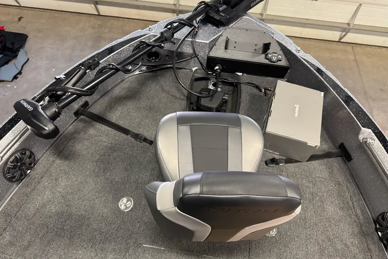 Slide: The Image of 2026 Nitro ZV20 Sport Pro boat interior with Garmin equipment and comfortable seating. - 20