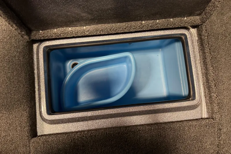Slide: The Image of Blue storage compartment in 2026 Nitro ZV20 Sport Pro boat interior. - 25