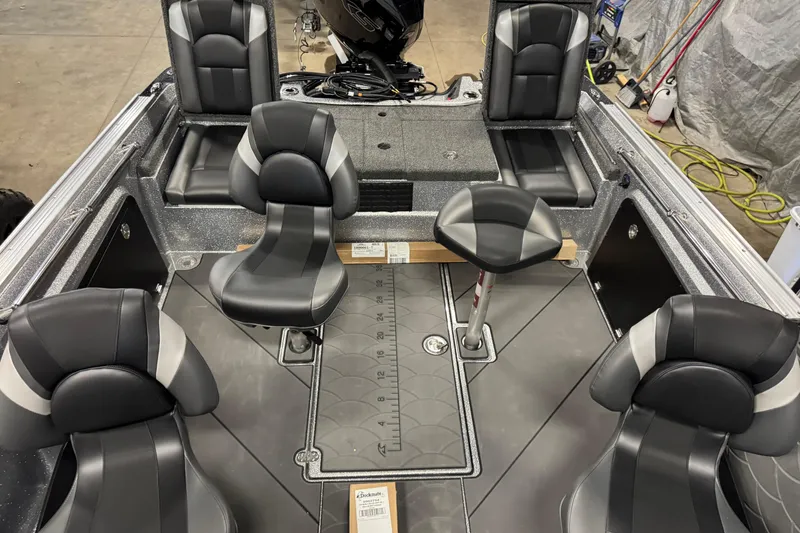 Slide: The Image of 2026 Nitro ZV20 Sport Pro boat interior with sleek black seating and modern design. - 26