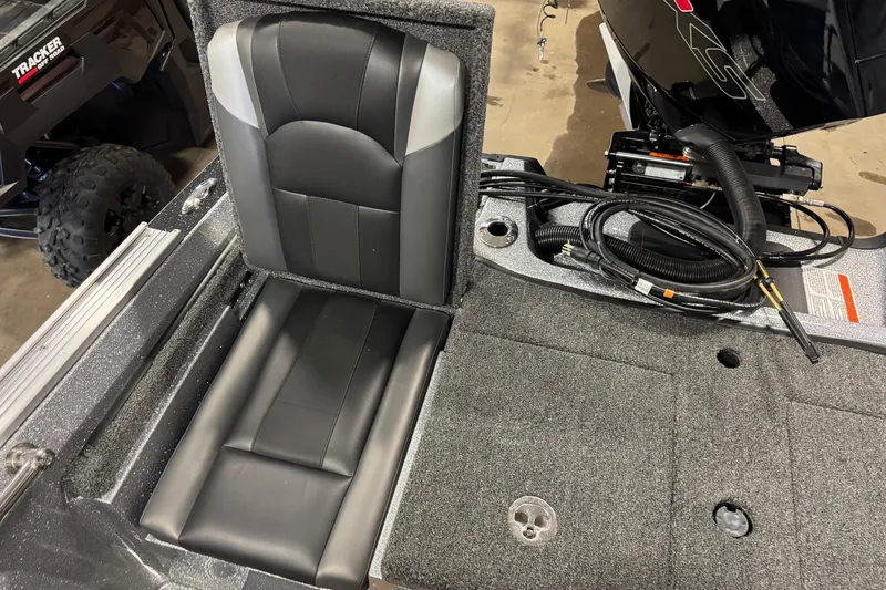 Slide: The Image of 2026 Nitro ZV20 Sport Pro boat interior with black and gray seating. - 8
