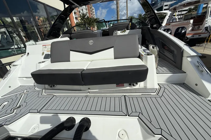 Slide: The Image of 2019 Cruisers Yachts 338 Outboard with sleek seating and modern deck design. - 15