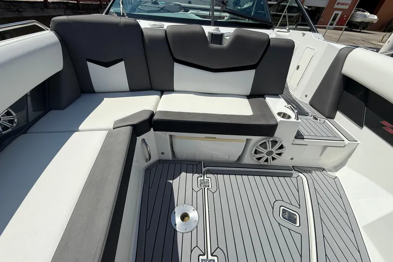 Slide: The Image of 2019 Cruisers Yachts 338 Outboard interior with sleek seating and modern design. - 16