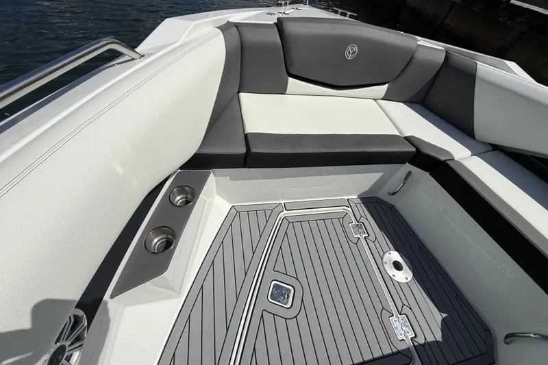 Slide: The Image of 2019 Cruisers Yachts 338 Outboard interior with sleek seating and modern flooring design. - 19