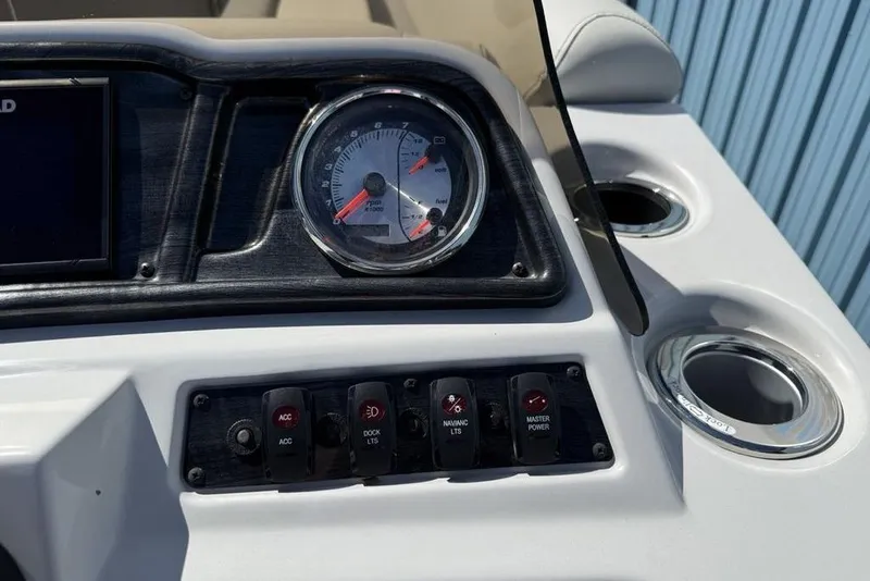 Slide: The Image of Dashboard of 2021 Godfrey SW 2286 SFL GTP boat with gauges and controls. - 15