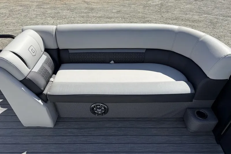 Slide: The Image of 2021 Godfrey SW 2286 SFL GTP boat seat with gray upholstery and cup holder. - 2