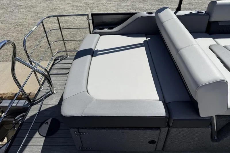 Slide: The Image of 2021 Godfrey SW 2286 SFL GTP boat with gray seating and metal railing. - 22