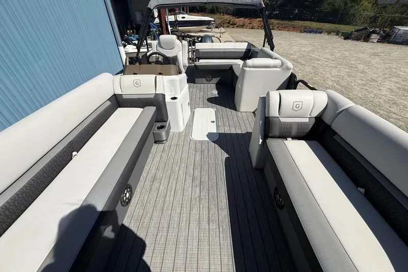 Slide: The Image of 2021 Godfrey SW 2286 SFL GTP pontoon boat interior with spacious seating and modern design. - 27