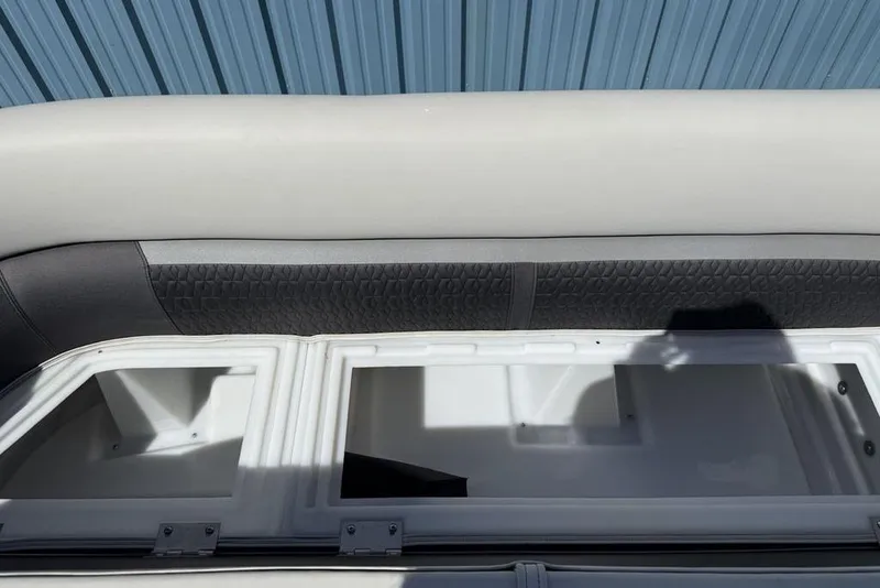 Slide: The Image of 2021 Godfrey SW 2286 SFL GTP boat storage compartment with cushioned seating. - 8