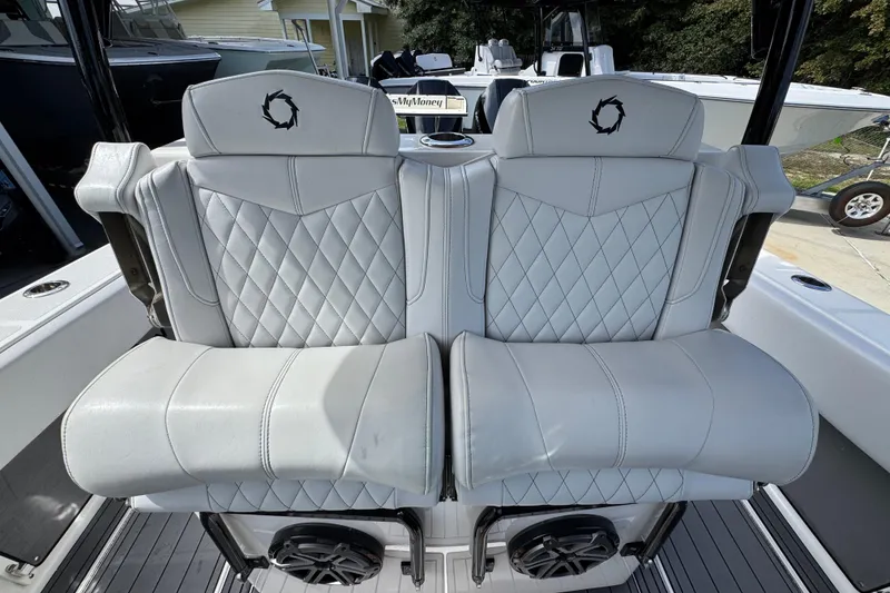 Slide: The Image of Luxury seating on 2020 Fountain 38 Tournament Edition boat, featuring diamond-stitched upholstery. - 25