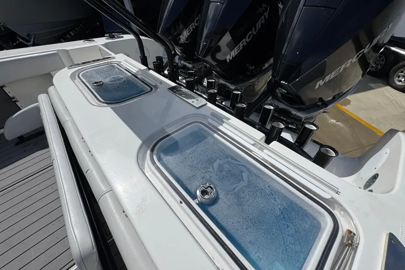 Slide: The Image of 2020 Fountain 38 Tournament Edition boat with Mercury engines and livewell compartments. - 37