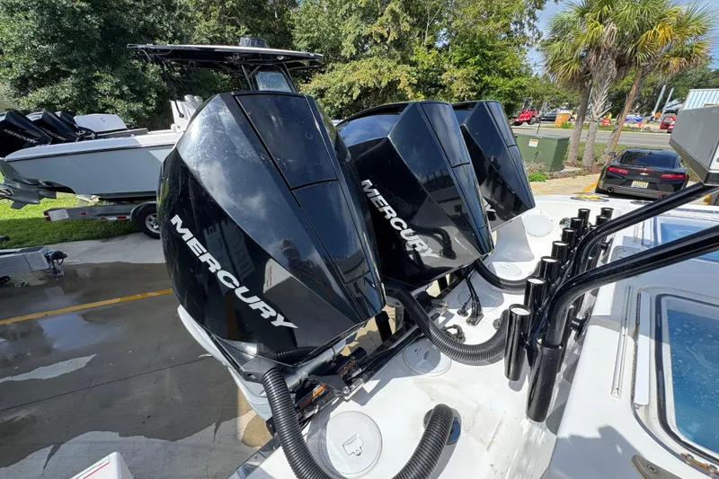 Slide: The Image of 2020 Fountain 38 Tournament Edition boat with triple Mercury outboard engines. - 39