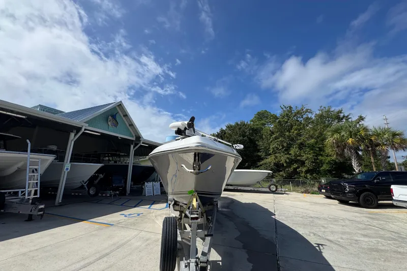 Slide: The Image of 2020 Fountain 38 Tournament Edition boat on trailer under clear blue sky. - 5