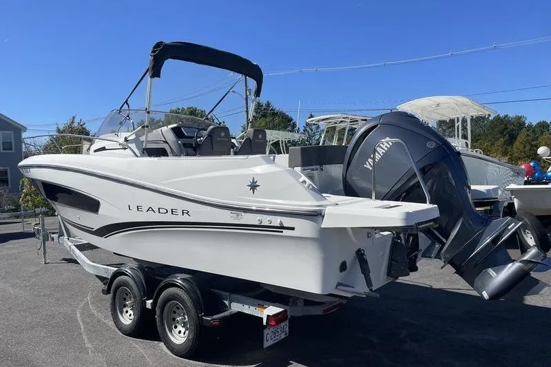 Slide: The Image of 2022 Jeanneau 7.5 Leader boat on trailer with Yamaha outboard motor. - 5
